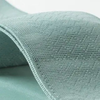 BC Babycare Modal Postpartum Belly Wrap Band in green, close-up of soft knit fabric and curved edge highlighting stretch