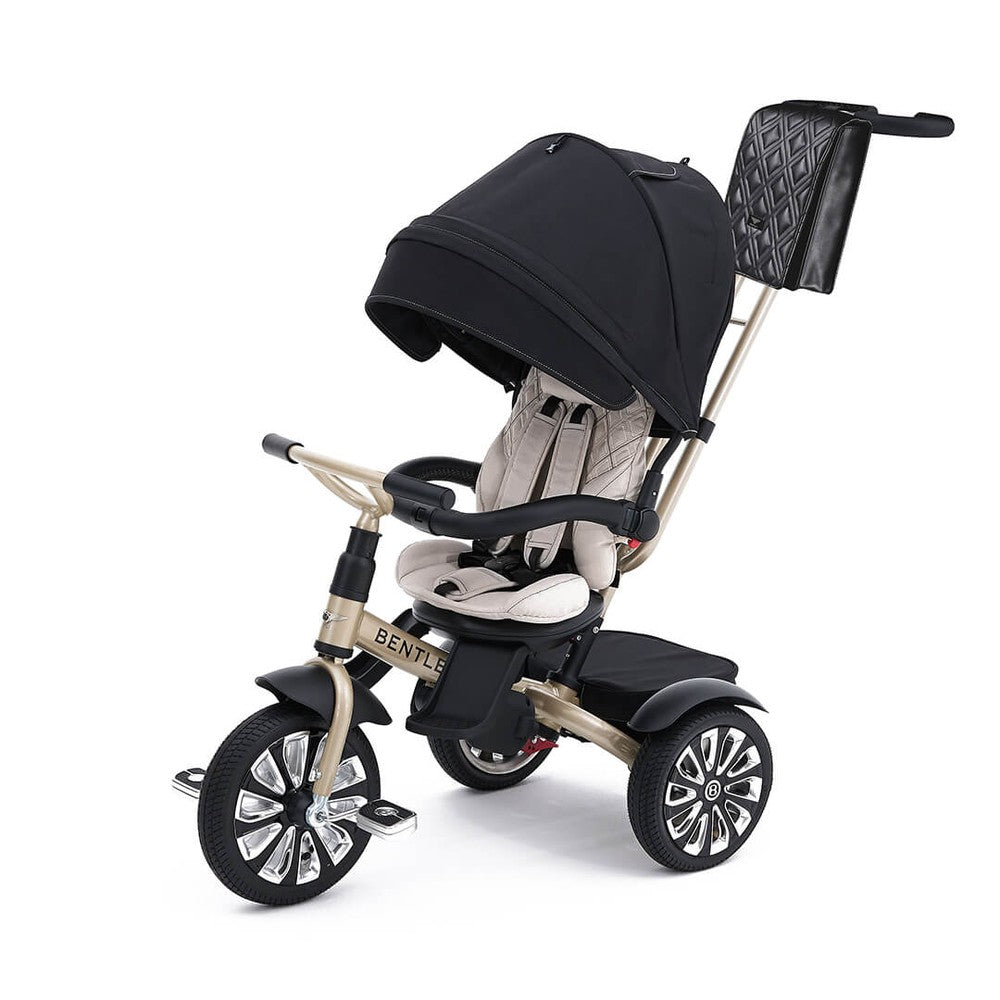 Bentley Trike 6-in-1 V2 Mulliner Gold toddler tricycle with beige frame and black canopy