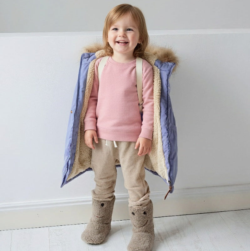 Boxbo Wistiti Fleece Lined Waterproof & Snowproof Fur Jacket Mauve Lavender worn open to reveal plush fleece by a smiling toddler.