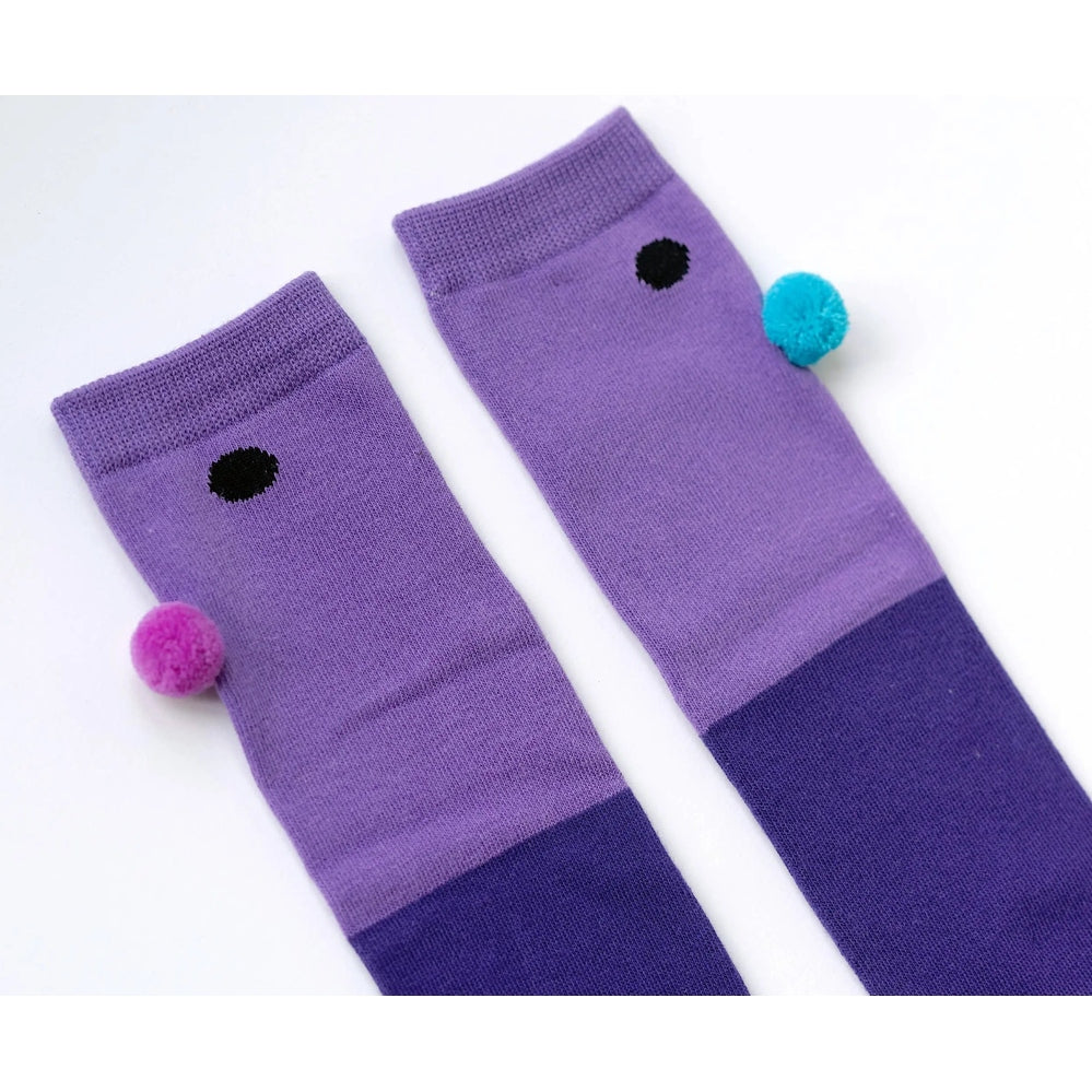 Boxbo Wistiti High Sock Violet pair shown laid flat with pink and turquoise pom-poms attached, set of 2.