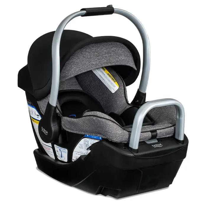 Britax Willow SC Car Seat with Alpine Base in gray fabric, handle raised for carrying.