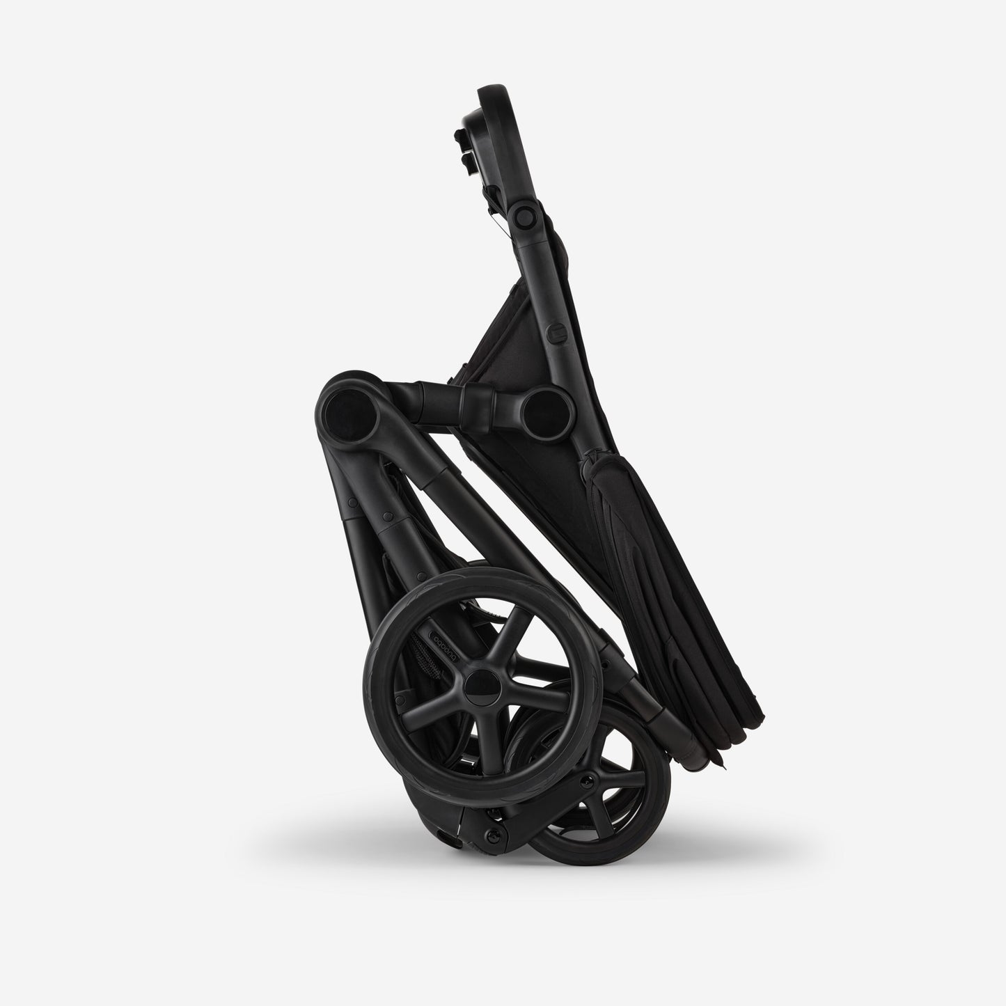 Bugaboo Kangaroo Complete Stroller in black, folded compactly with wheels visible.