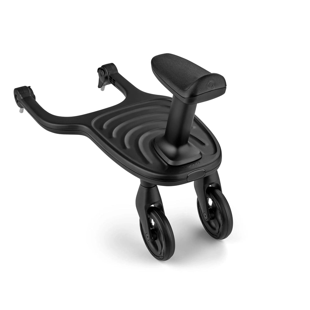 Bugaboo Wheeled Board in black, two wheels under a ribbed footrest for easy mounting on strollers