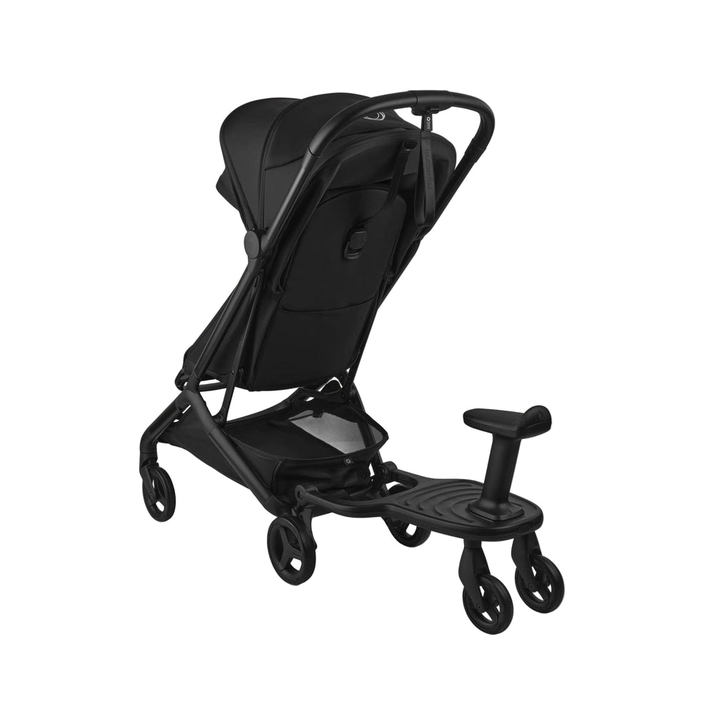 Bugaboo Wheeled Board on a black stroller, showing the standing platform and push handle for a rider.