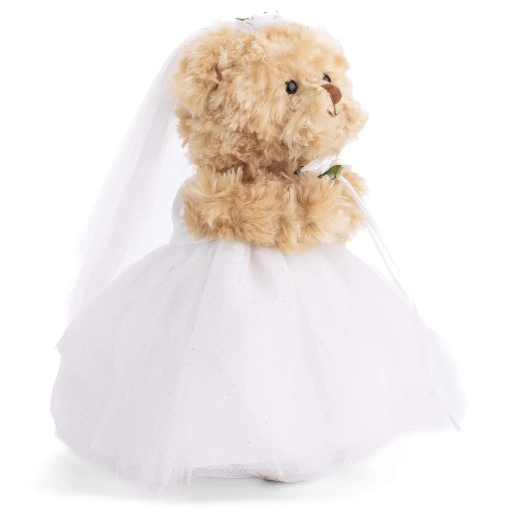 Bukowski Bears Bride stuffed animal in a white wedding dress and veil, posing upright with fluffy fur.