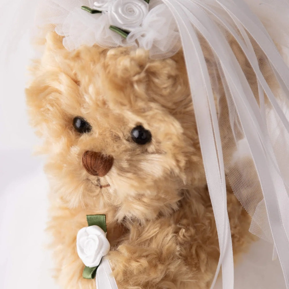 Bukowski Bears Bride stuffed animal in a white bridal veil with a white rose, fluffy tan plush