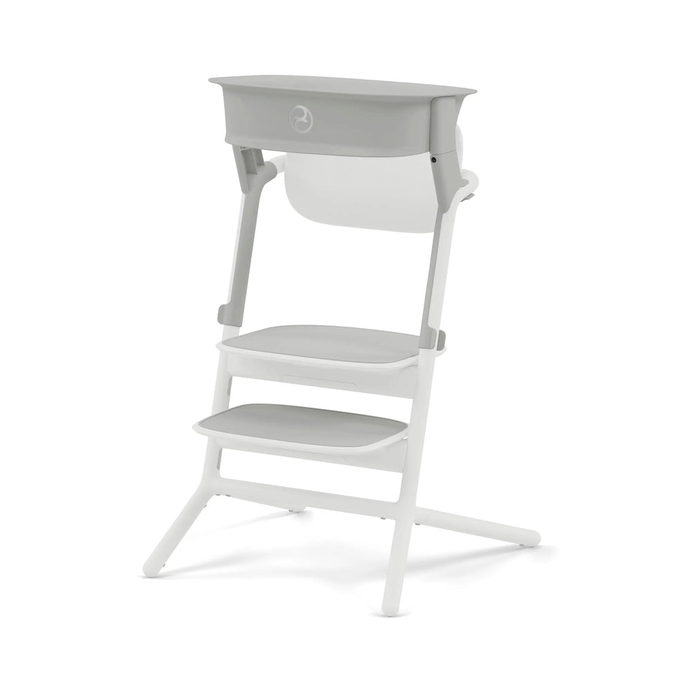 Cybex Lemo Training Tower in white and gray stands open with three stepped platforms for toddler training.