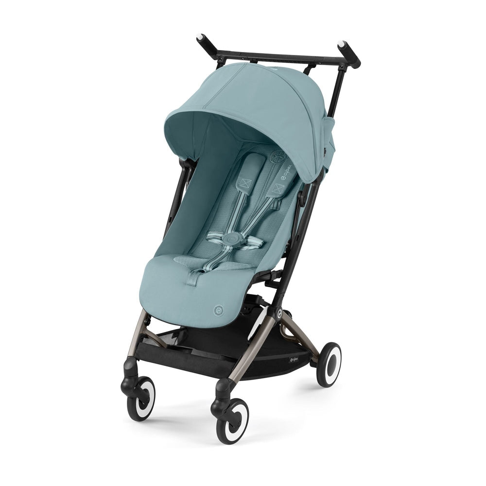 Cybex Libelle 2 stroller in teal with extended canopy and visible 5-point harness, ready to stroll on four wheels.