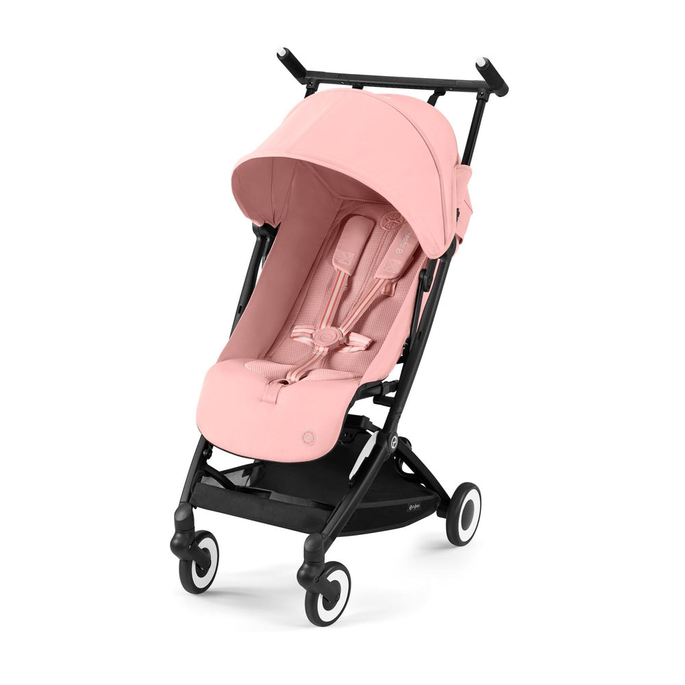 CYBEX Libelle 2 stroller in pink with canopy and 5-point harness engaged on a black frame.