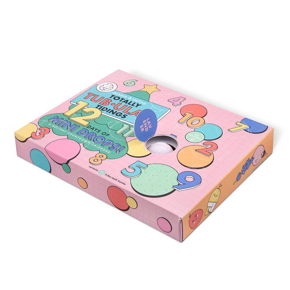 Dabble & Dollop 12 Days of Mini Drops Bath Bomb Countdown Calendar in pink, featuring numbered day panels and a central bath bomb opening.