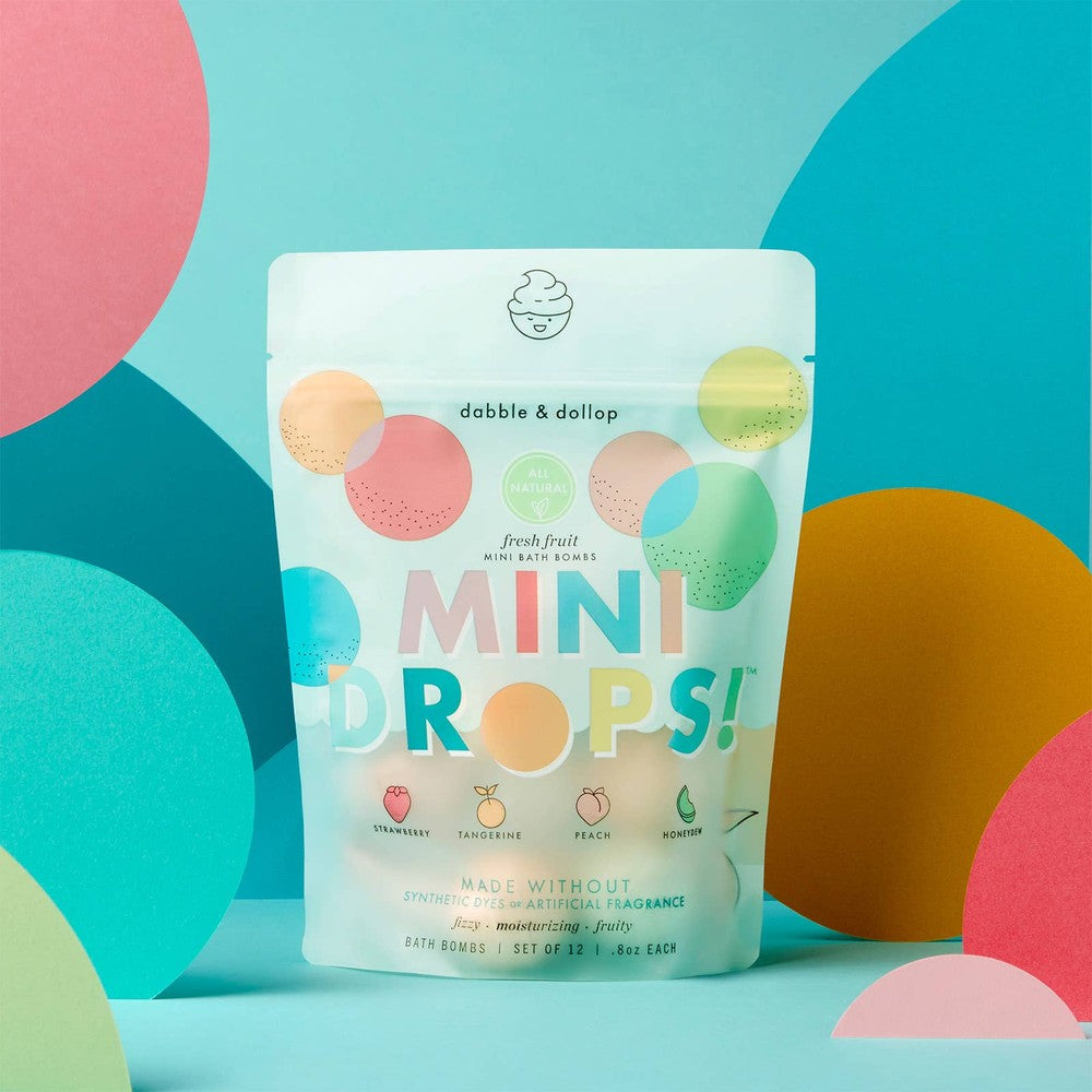 Dabble & Dollop Mini Drops Bath Bombs bag in pastel packaging, showing strawberry, tangerine, peach icons.