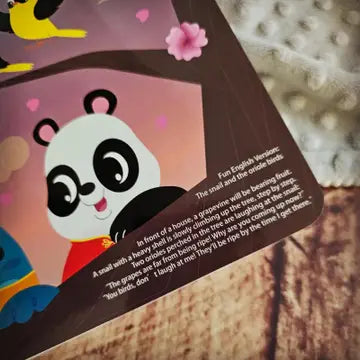 Ditty Bird Sound Book Chinese Songs Vol 2 USB-C Rechargeable; panda illustration on colorful pages, a child taps to trigger sounds.