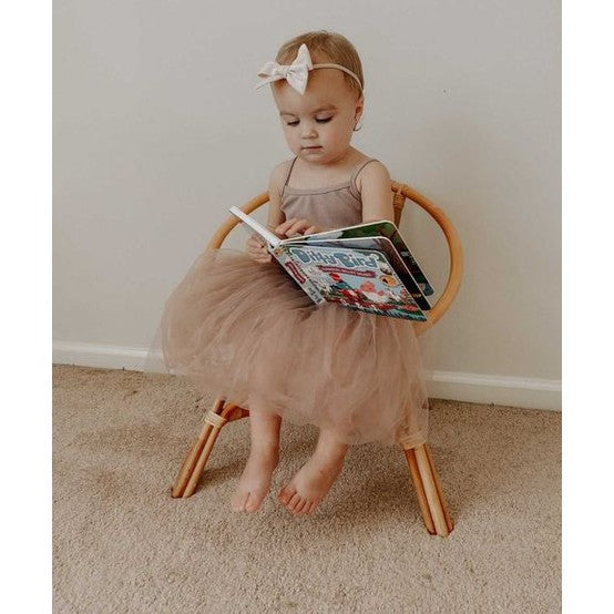 Ditty Bird Sound Book Classical Ballet Music USB-C Rechargeable educational toy; toddler in a pink tutu reads a colorful book.