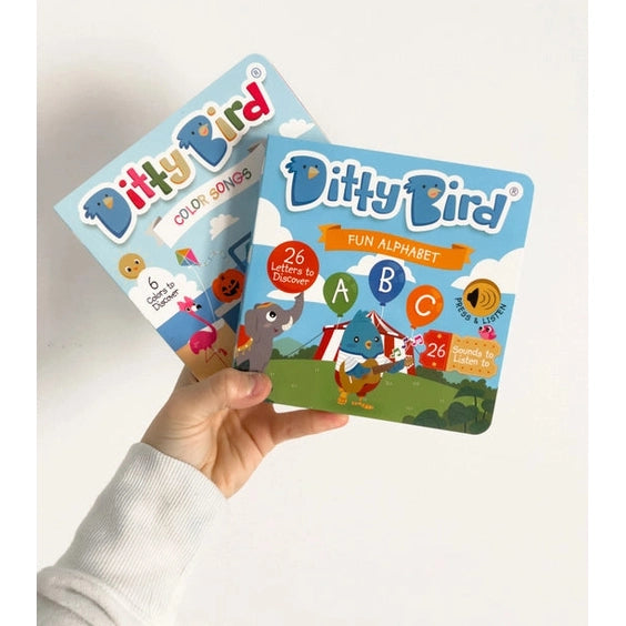 Ditty Bird Sound Book Color Songs USB-C Rechargeable, blue educational book held in a hand showing ABC letters.