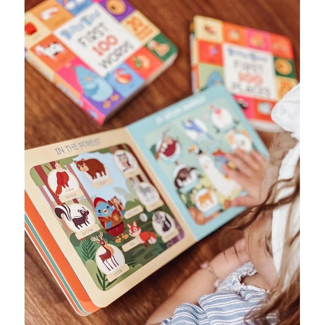 Ditty Bird Sound Book First 100 Animals USB-C Rechargeable opened as a child reads colorful animal pages.