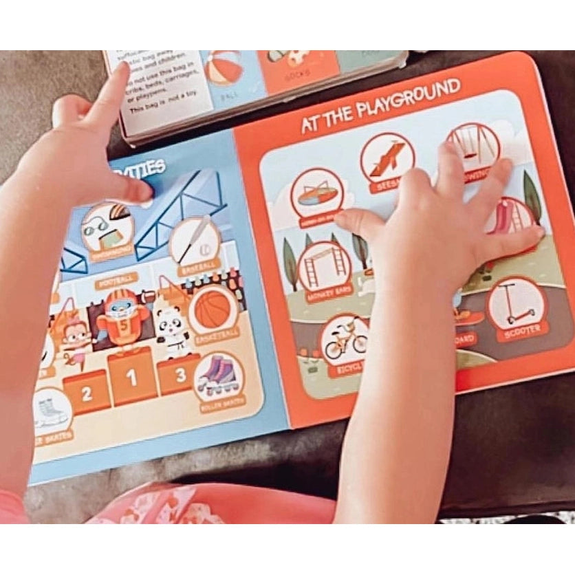 Ditty Bird Sound Book First 100 Places USB-C Rechargeable, bright playground pages as child turns and explores.