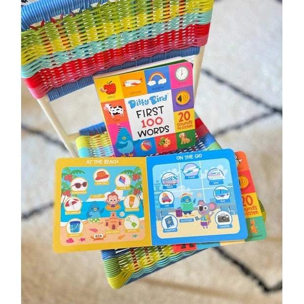 Ditty Bird Sound Book First 100 Words opened on a colorful chair, with bright illustrations and 20 sounds.