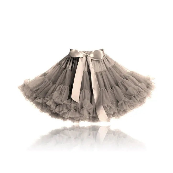 DOLLY BY LE PETIT TOM Pettiskirt in taupe with satin bow, airy layered tulle flaring as it spins.