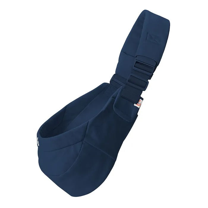 ERGOBABY Upsie Sling Carrier in navy with padded shoulder strap and buckles for hands-free baby carry.