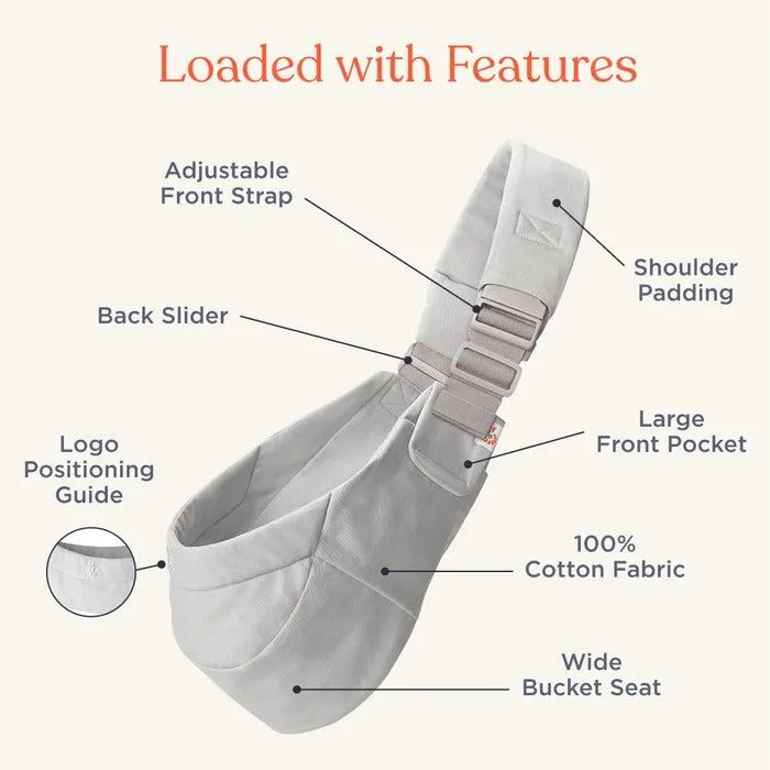 ERGOBABY Upsie Sling Carrier in gray with adjustable front strap and shoulder padding worn by caregiver.