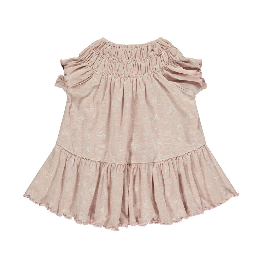 Ettie & H Pale Pink Flowers Dress, pale pink with white florals, laid flat showing smocked neckline, puff sleeves, tiered hem