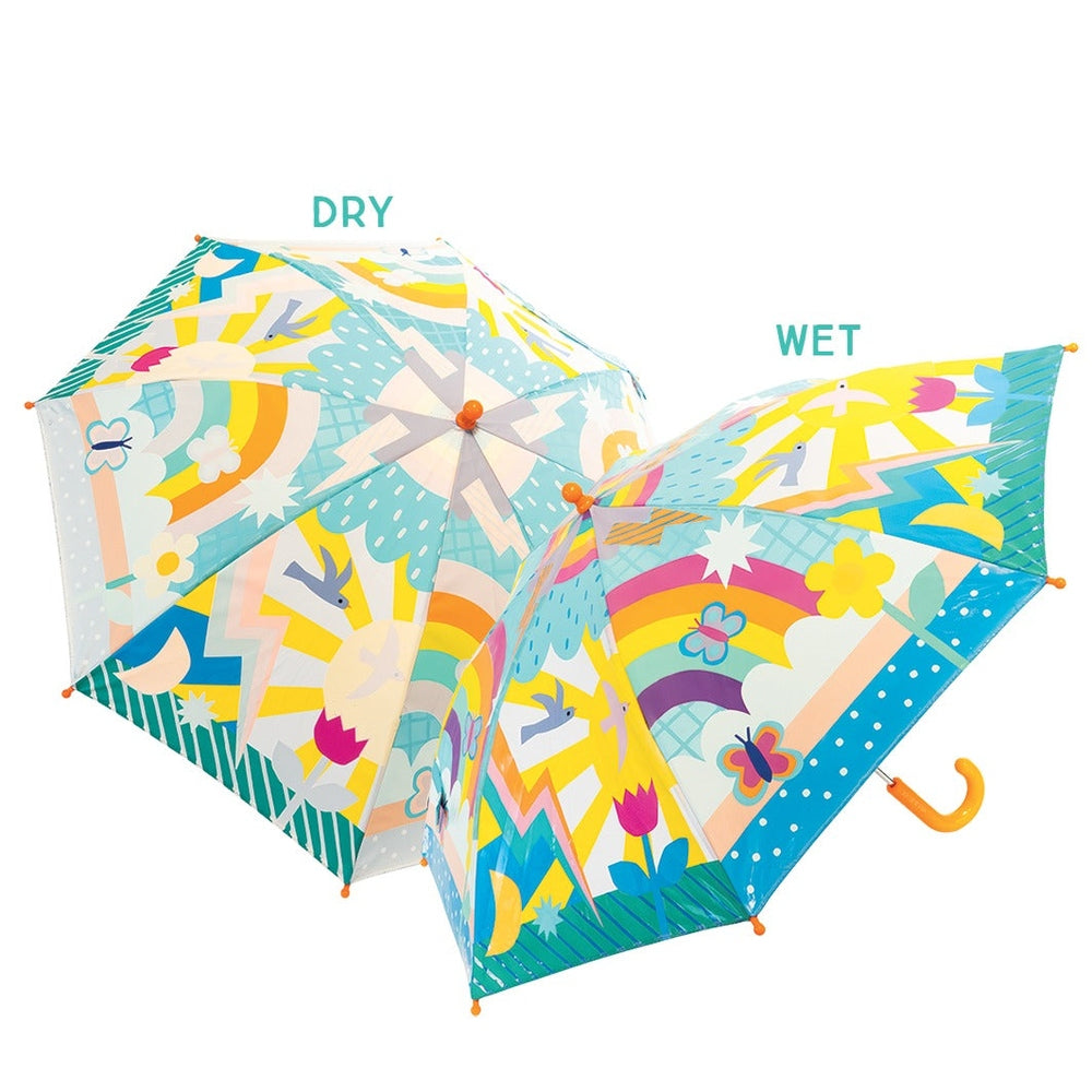 Floss And Rock Color Change Umbrellas Rainbows, a pair of vibrant rainbow-pattern rain umbrellas opened flat.