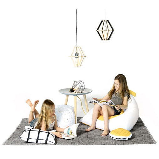 Gautier Studio Fiesta bean bag chair, white with yellow accents, one comfy kids’ seating chair in a cozy space