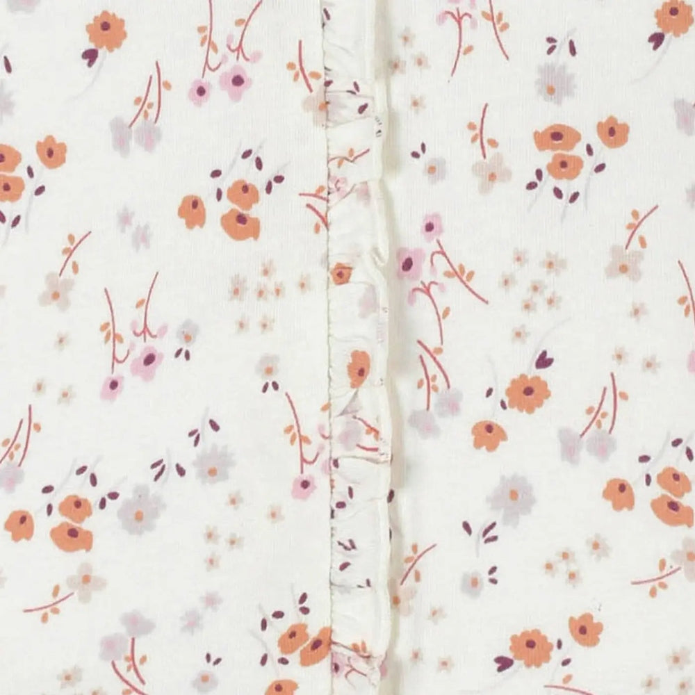 Gerber Baby Sleep 'N Play for baby boy, white fabric with pink-orange floral print and front snap placket.