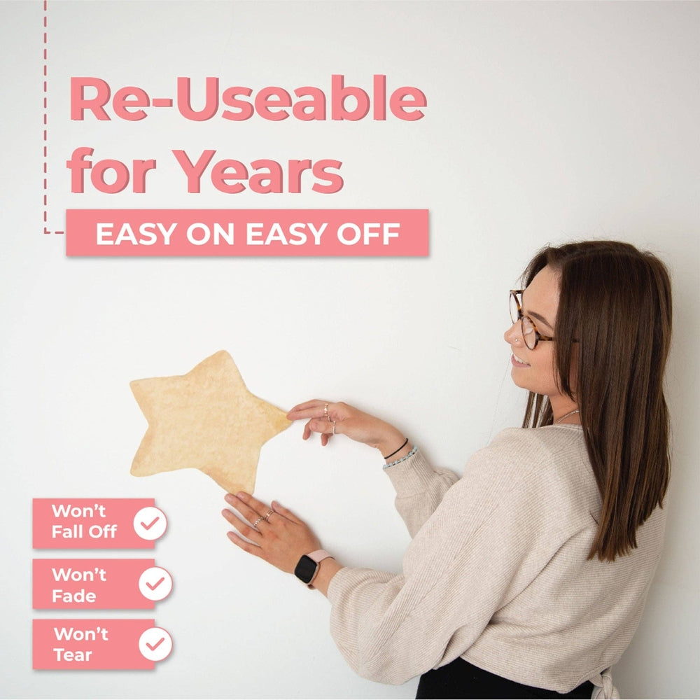 Hello Beautiful Designs ocean creatures nursery wall stickers set, reusable starfish decal in pink tones.