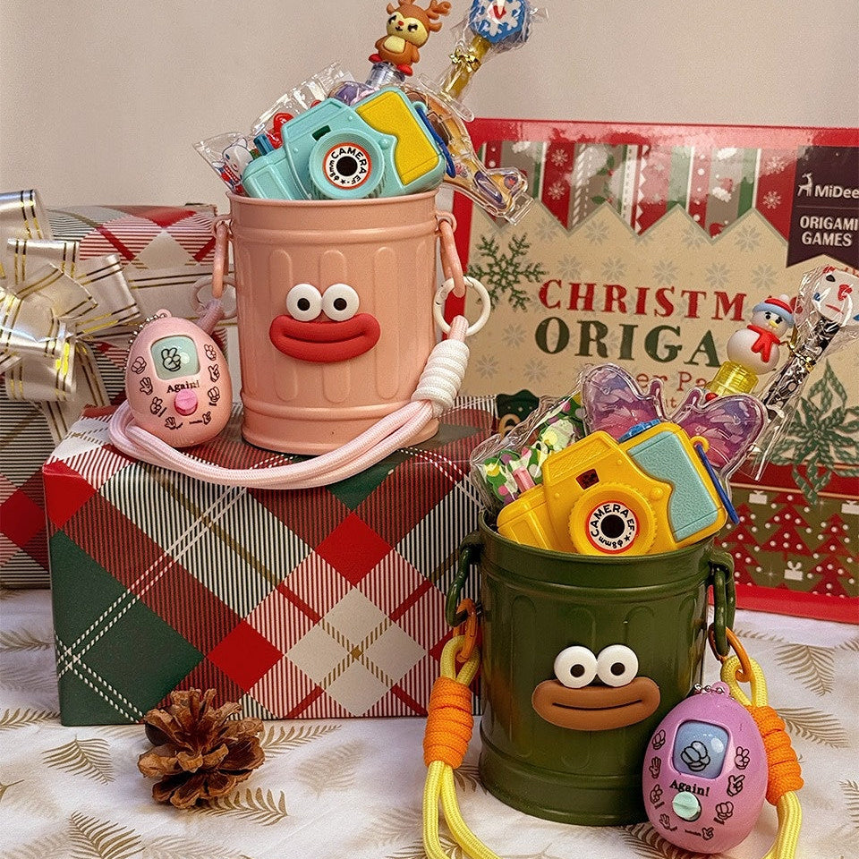 Holiday Stationery Gift Basket by baby enRoute: two smiling pink and green toy buckets overflowing with colorful kid toys.