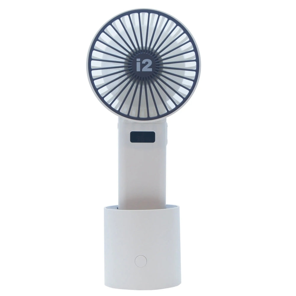 I2 Handheld 5 Speed Lithium Battery Fan, white plastic with circular guard, shown mounted on its base for hands-free use
