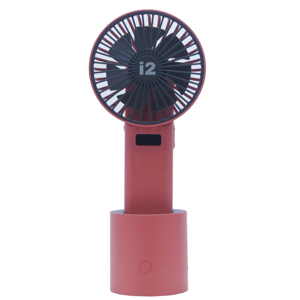 I2 Handheld 5 Speed Lithium Battery Fan in red, perched on its compact dock with blades visible behind the guard.