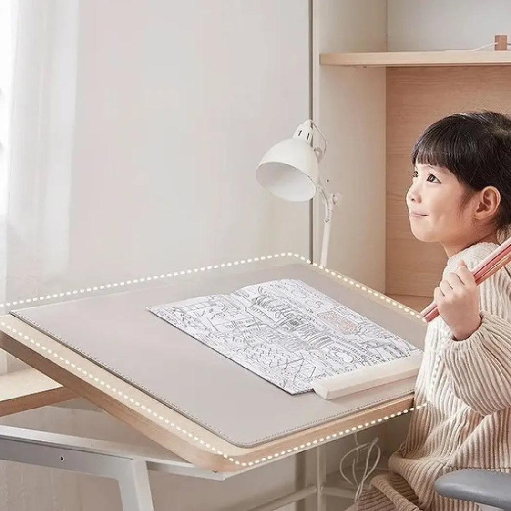 Iloom Linki Plus Smart Desk Pad, light grey with LED edge lighting on a tidy desk setup