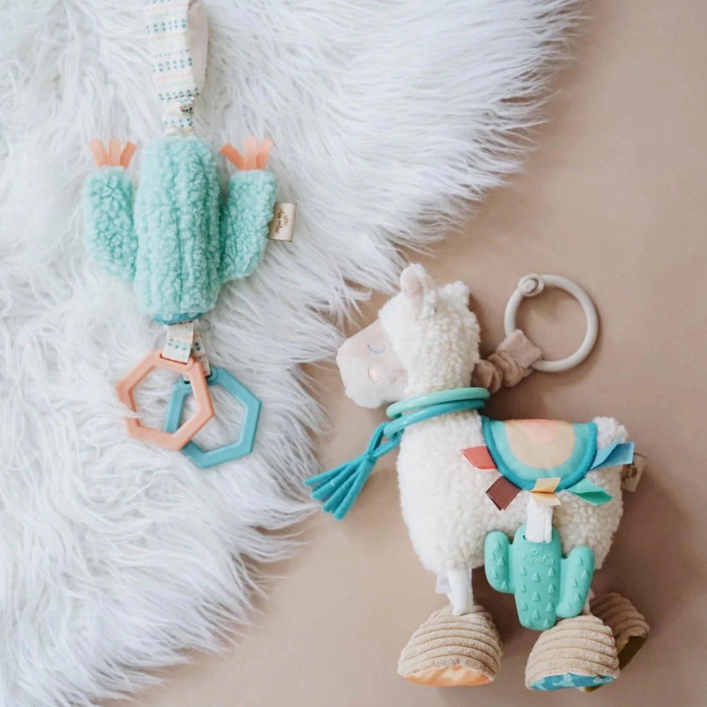 Itzy Ritzy Itzy Friends Link & Love activity plush llama and mint cactus teether with pastel accents