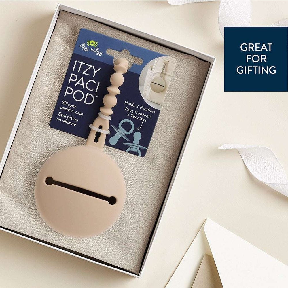 Itzy Ritzy Itzy Paci Pod silicone pacifier case in beige with clip for on-the-go use
