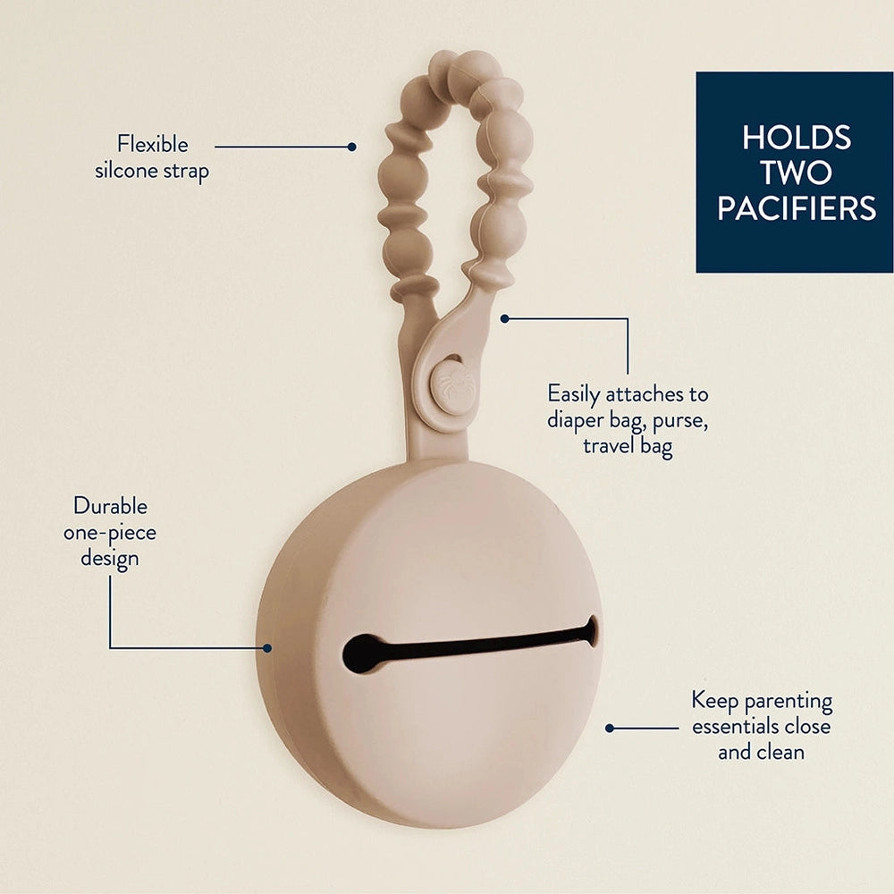 Itzy Ritzy Itzy Paci Pod pacifier holder for two pacis with a beige, flexible silicone strap