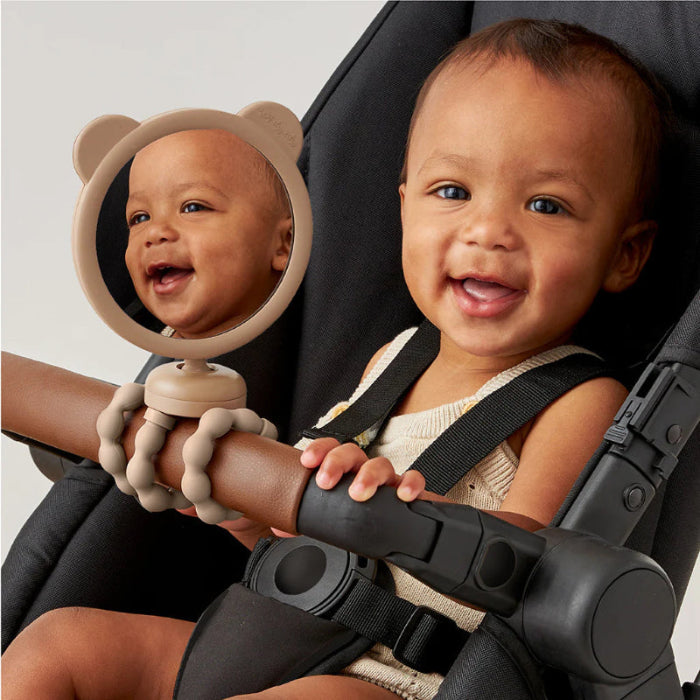 Itzy Ritzy Itzy Peek Stroller Mirror beige bear-ear frame; baby reflected in mirror