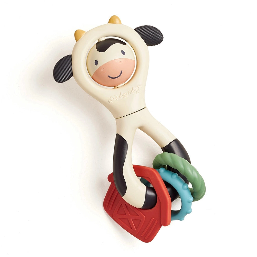 Itzy Ritzy Itzy Spinner cow teether with cream body and red, blue, green rings