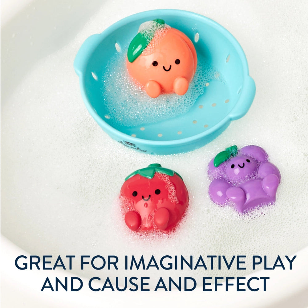 Itzy Splash Pals bath toys set of 3 fruit characters—orange peach, red strawberry, purple grape—in bubbly bath.