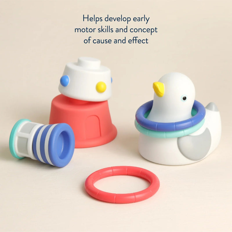 Itzy Ritzy Seaside Splash bath toy set featuring a white duck tub ring and four stacking cups