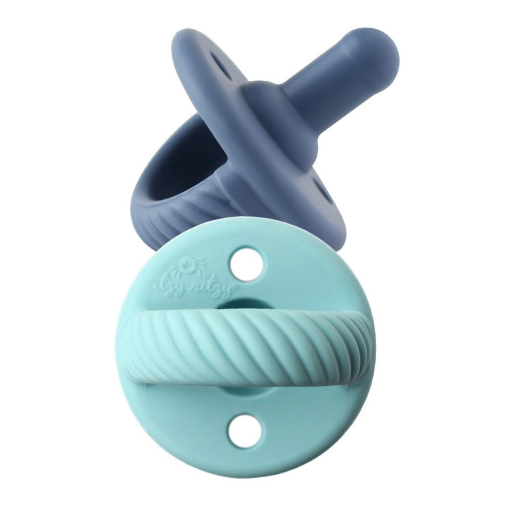 Itzy Ritzy Sweetie Soother Pacifier Sets 2 Pack 0M+ featuring blue nipple and teal shield with ribbed ring.