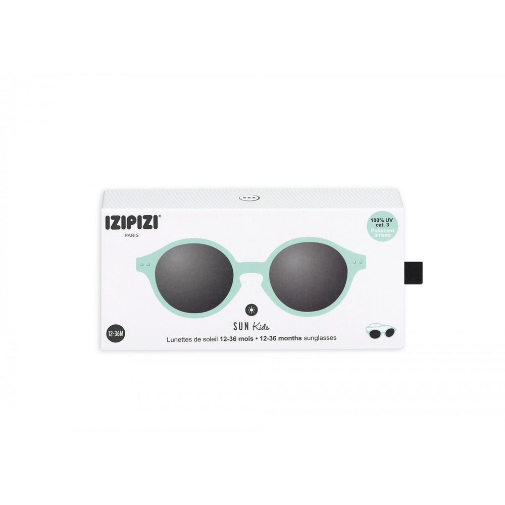 IZIPIZI Kids Sky Blue sunglasses in mint-green frames with dark lenses, packaged