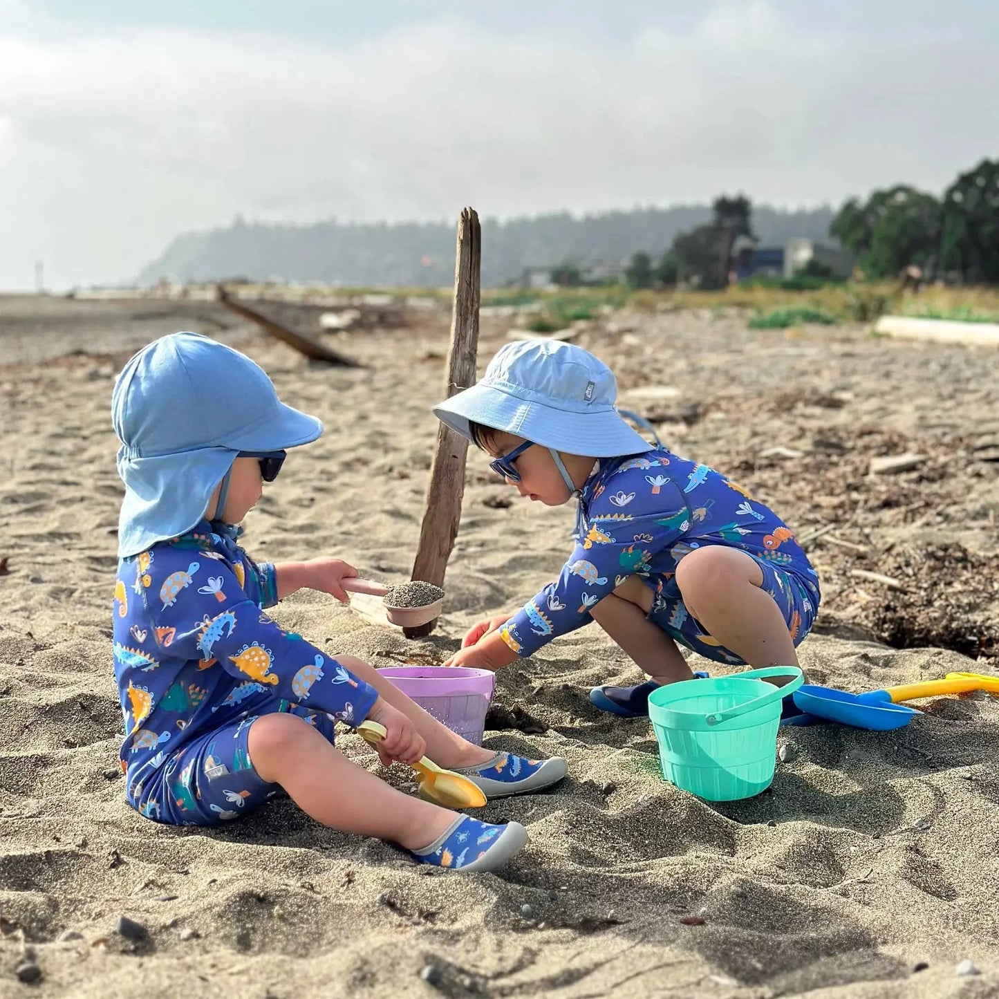 Jan & Jul kids water shoes blue, two children on the beach