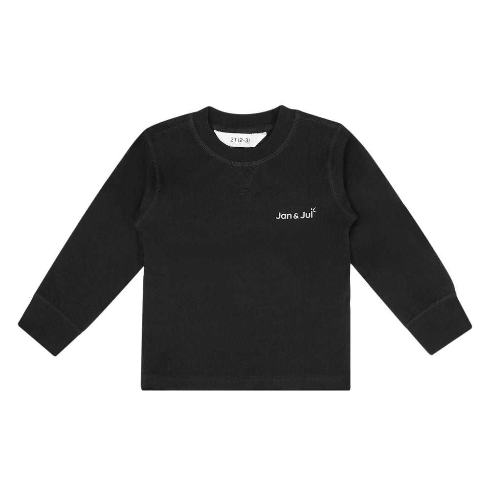 Jan & Jul Kids Cotton Blend Base Layer Top Black with logo, long sleeves, laid flat.