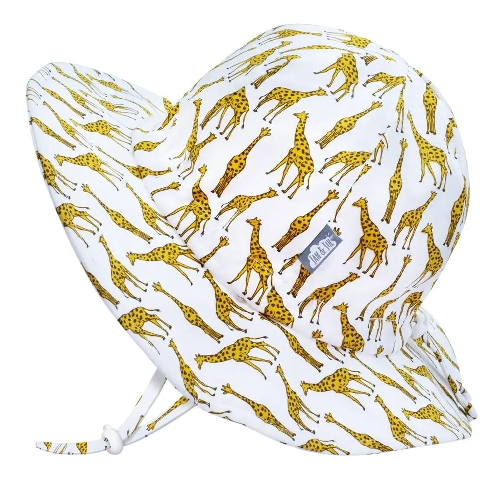Jan & Jul Kids Cotton Floppy Hat Giraffe, white with yellow giraffe print, adjustable tie keeps it secure on babies.