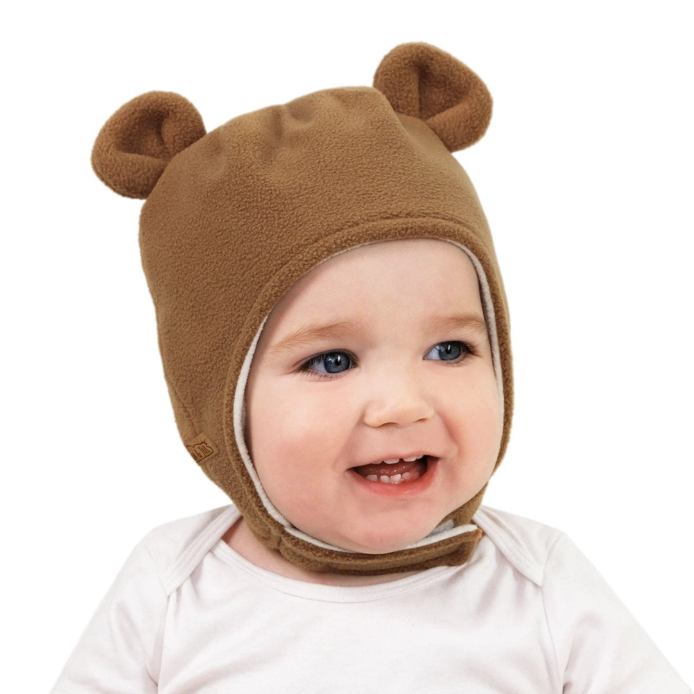 Jan & Jul Kids Fleece Animal Hats Brown Bear hat on a smiling baby, cozy fleece with bear ears.