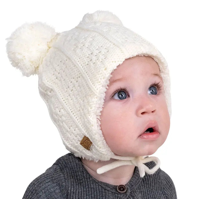 Jan & Jul Kids Knitted Beanie Hat Cream Bear, a baby wearing cream knit beanie with bear ears and ties.