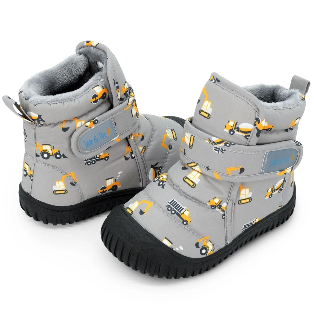 JAN & JUL Toasty Dry Booties Grey Construction; soft faux‑fur lining, rugged black outsole, yellow truck print.
