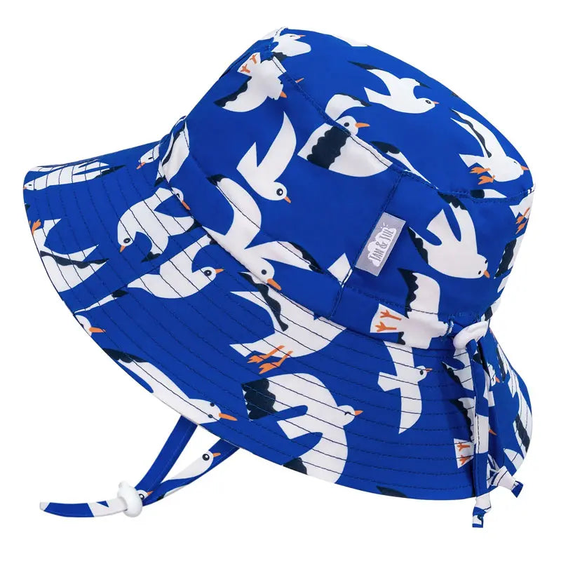 Jan & Jul Water Repellent Bucket Hat Seagull print in bright blue with white gulls and chin strap.