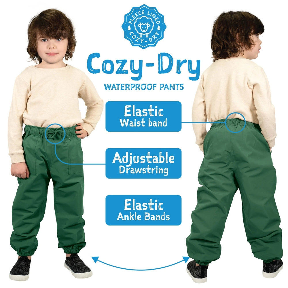 JAN & JUL Cozy-Dry Waterproof Rain Pants, green, elastic waist with drawstring and ankle bands worn by a child.